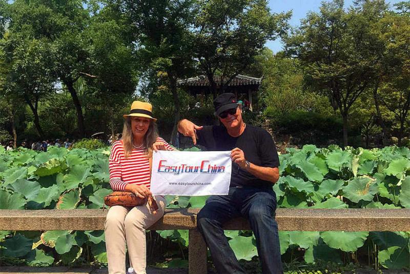 Senior couuple visit Yu Garden Shanghai